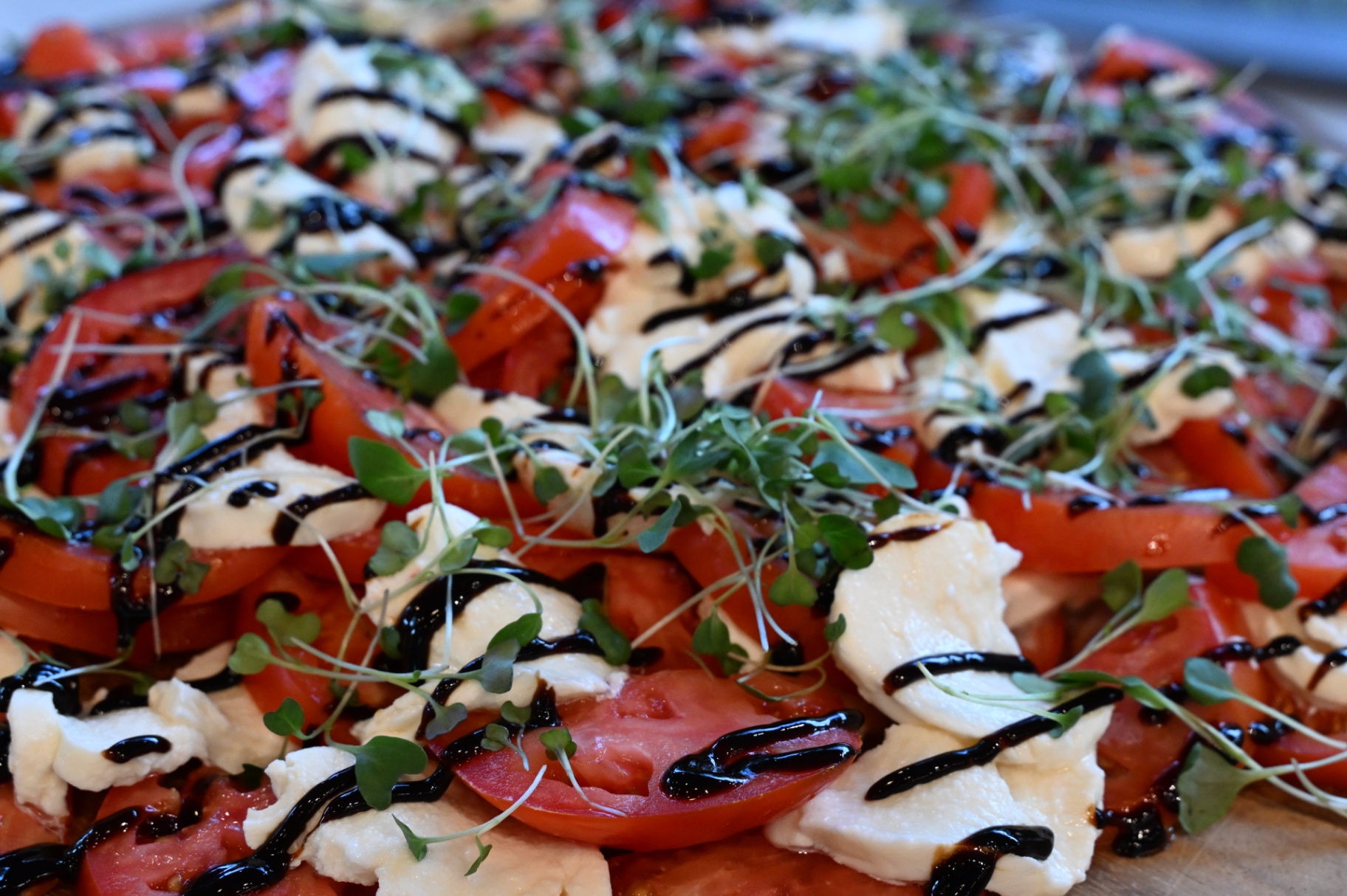 Caprese platter with heirloom tomatoes, mozzarella and balsamic glaze