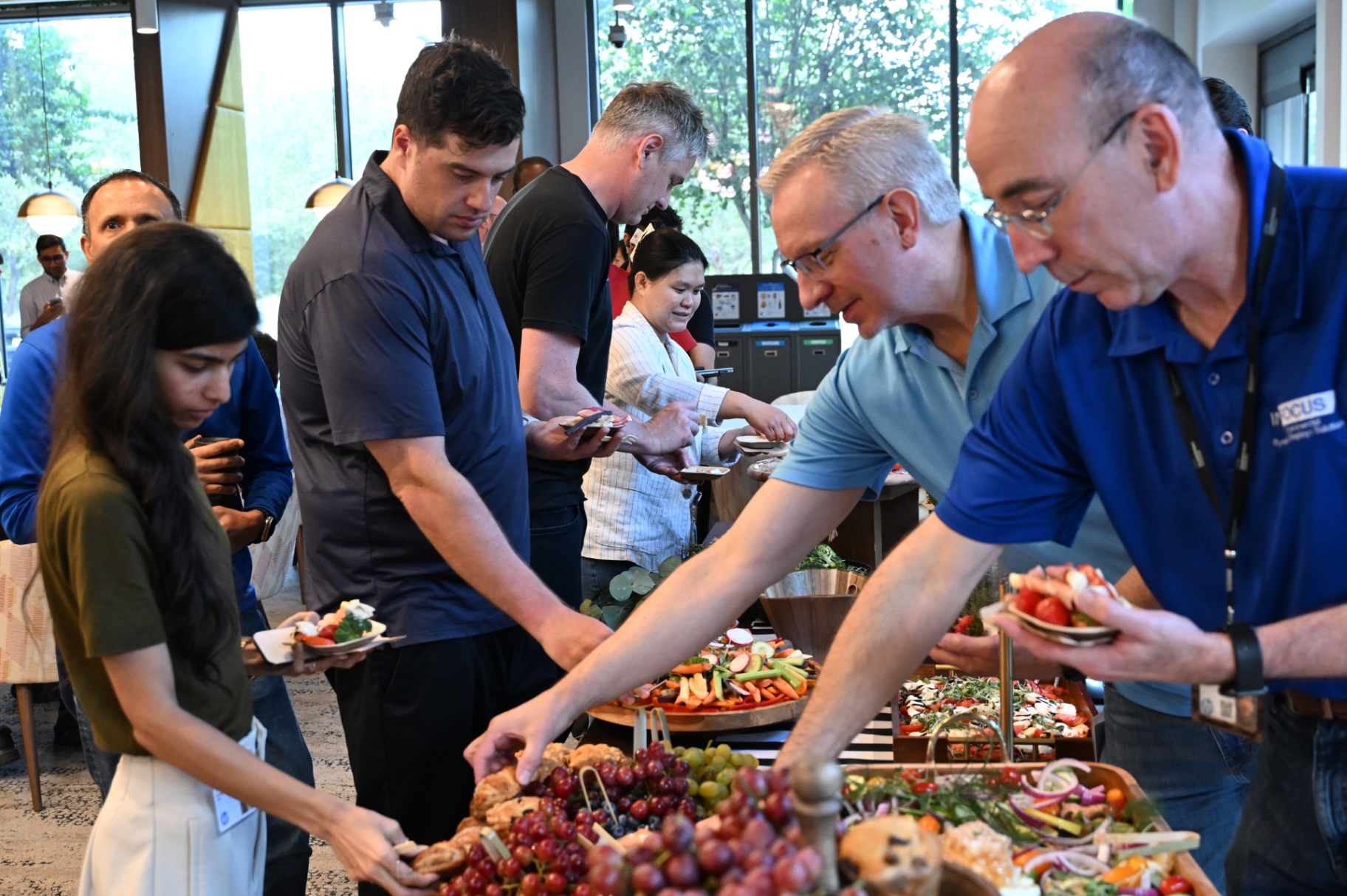 Corporate event guests enjoying the grazing table